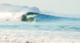 Hidden under the wave in surf 